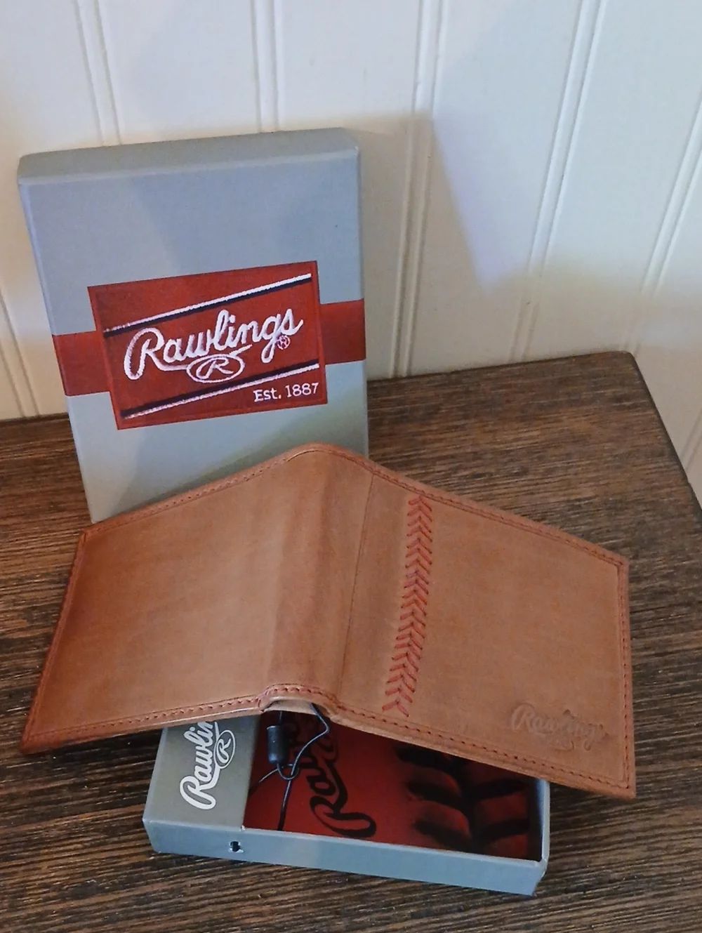 Rawlings red tan baseball